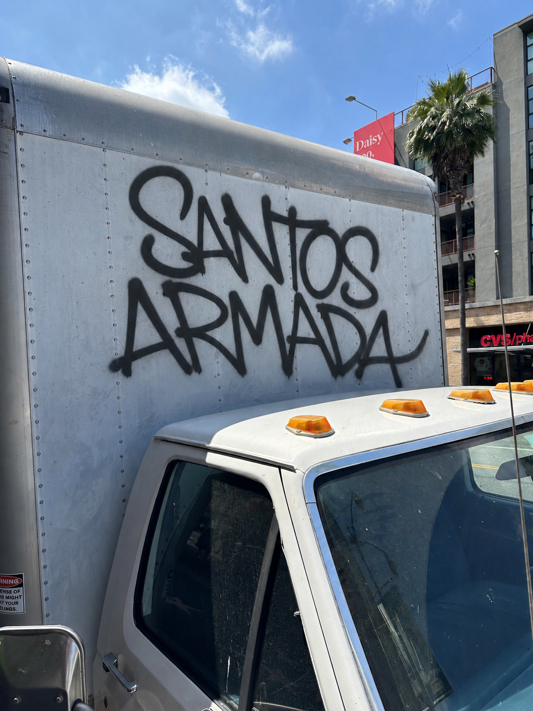 Santos Armada graffiti tag on a truck